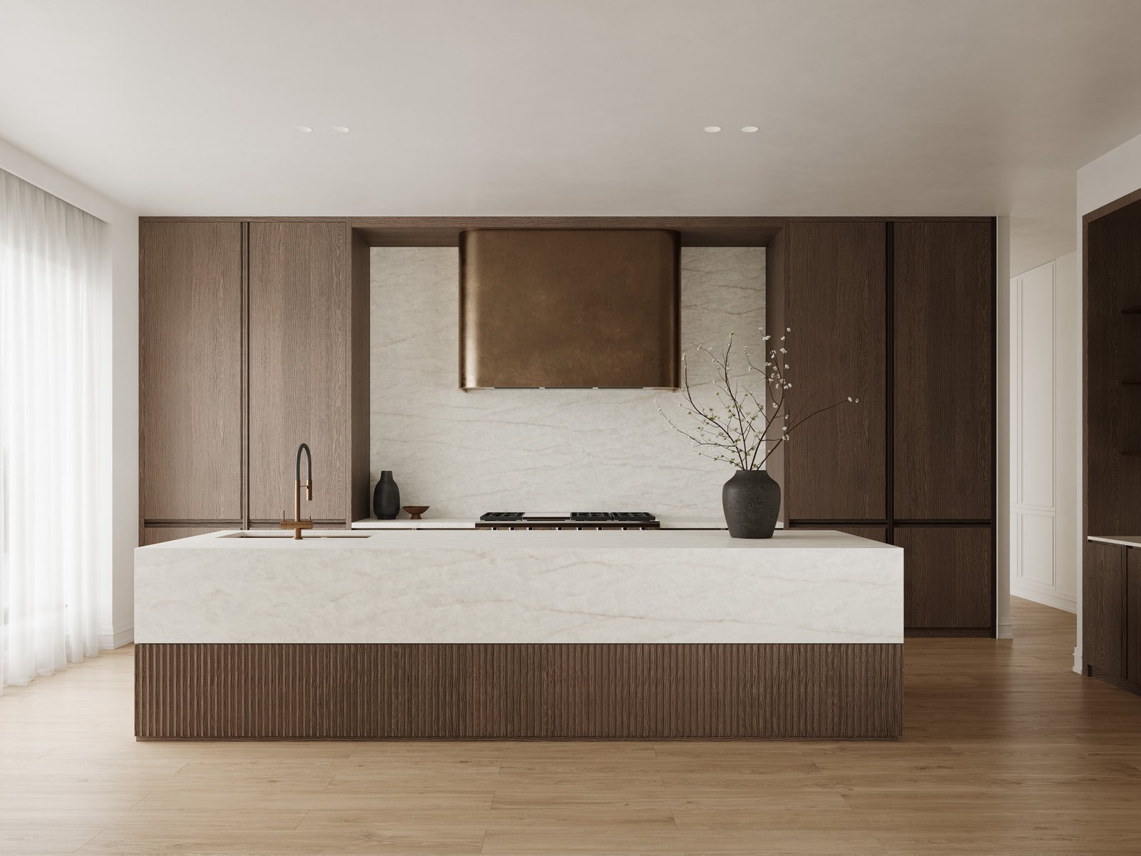 Warm timber kitchen with a pale veined stone island and splashback