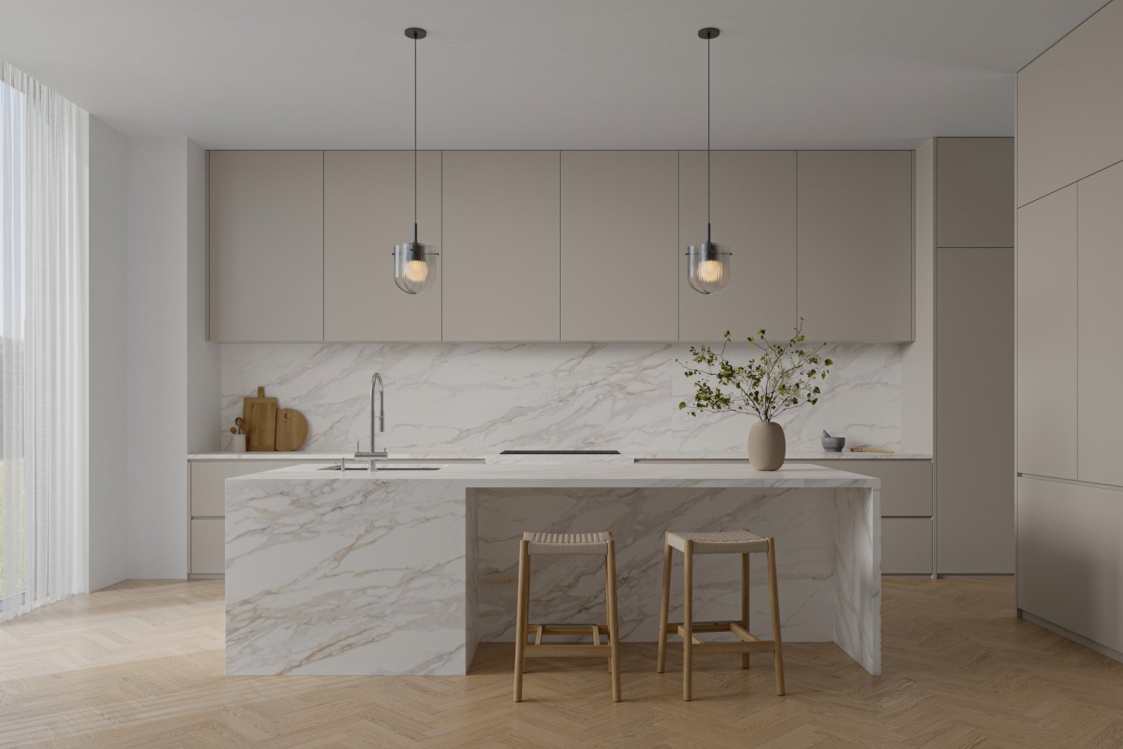 Soft grey kitchen with a white and gold veined marble-look island